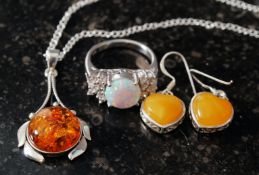 A silver and amber style nacklace on whi