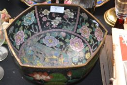 An oriental bowl depicting a peacock