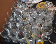 A selection of 30 branded drinking glasses to include Martini