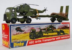 An original Dinky 618 diecast AEC Articulated military Transporter with Helicopter. In original box,