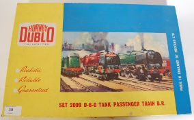 TRAINS: An original Hornby Dublo 2009 060 Tank Passenger Train boxed set.

NOTE: From a private