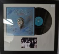 AUTOGRAPHS: The Eagles - Their Greatest Hits - fully signed LP record 7e1052a. Signed by each of