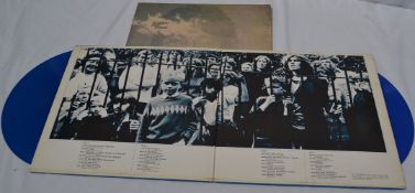 RECORD: The Beatles / 1967-1970 on blue vinyl sleeve VG. As for the recorde sides 1 and 2 show a