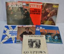 7 x vinyl records to include The Trekkers, Roy Orbison, The Monkees, Ray Charles, The Ventures etc,