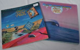 MEMORABILIA: Two vintage record vinyl album cover reference coffee table books.