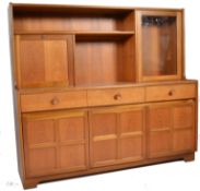 A retro 1970`s teak sideboard display cabinet having cupboard to base with upright section above