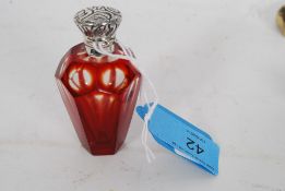 A white metal (tested as silver) glass scent bottle