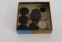 A collection of coins to include silver maundy money, George 3rd cartwheel, Victoria penny, George