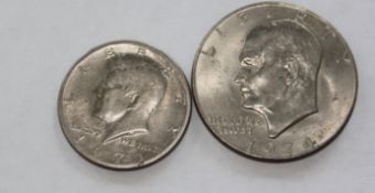 World Coins A 1977 US dollar together with a 1971 Kennedy half dollar