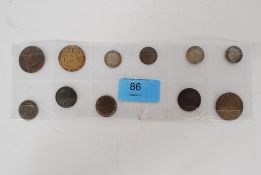 A collection of token coins to include George III copper token 1798, Victoria 1877, George III