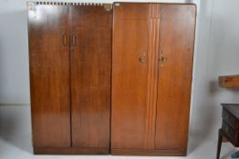 A 1930`s art deco double wardrobes with haberdashery shelves together with another having floral