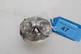 A 20th century chase decorated silver plated owl vesta case
