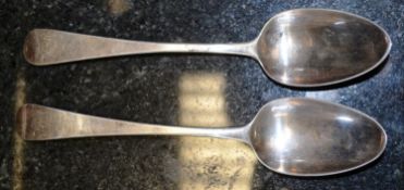 A pair of hallmarked silver spoons with Georgian silver marks for John Lambe, 1784. Each piece
