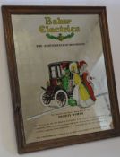 A vintage style advertising mirror for Bakers Electrics set within an oak frame with further