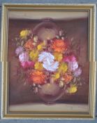 An oil on canvas of still life painting of flowers in vase, with indestinct signature to corner.