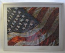 A framed and glazed contemporary jigsaw puzzle of the United States of America flag with individual
