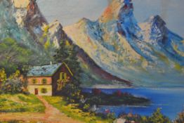 A 20th century Continental school oil on canvas painting of a lake and mountain scene, possibly