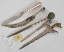 A collection of silver white metal to include Berlin Bear letter opener (stamped 800), a white metal