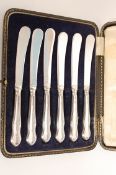 A set of 6 hallmarked sterling silver handled fruit knives by GWF, in original box.