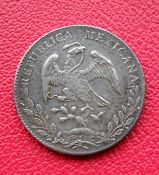 COINS: A Mexico 1893 eight reales.