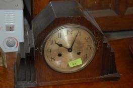 An Art Deco mantle clock along with another