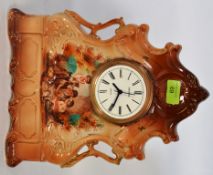 A 19th century Staffordshire clock mount with later dial, depicting transfer printed children.