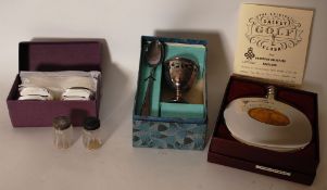A collection of silver plate items to include a Dalvey Golf hip flask, white metal napkin rings,