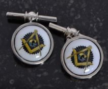 A pair of white silver metal (stamped 925) and enamel set Masonic emblem cufflinks