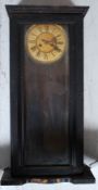 A 19th century walnut regulator wall clock in the manner of gustav becker set within a mahogany case