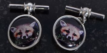 A pair of white silver metal (stamped 925 ) fox hunting related cufflinks, with enamel set