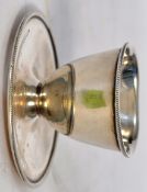 A hallmarked sterling silver egg cup, makers mark JD&S. Weight 64gms