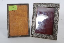 Silver hallmarked picture frames along with a Rococo silver picture frame stamped 900.