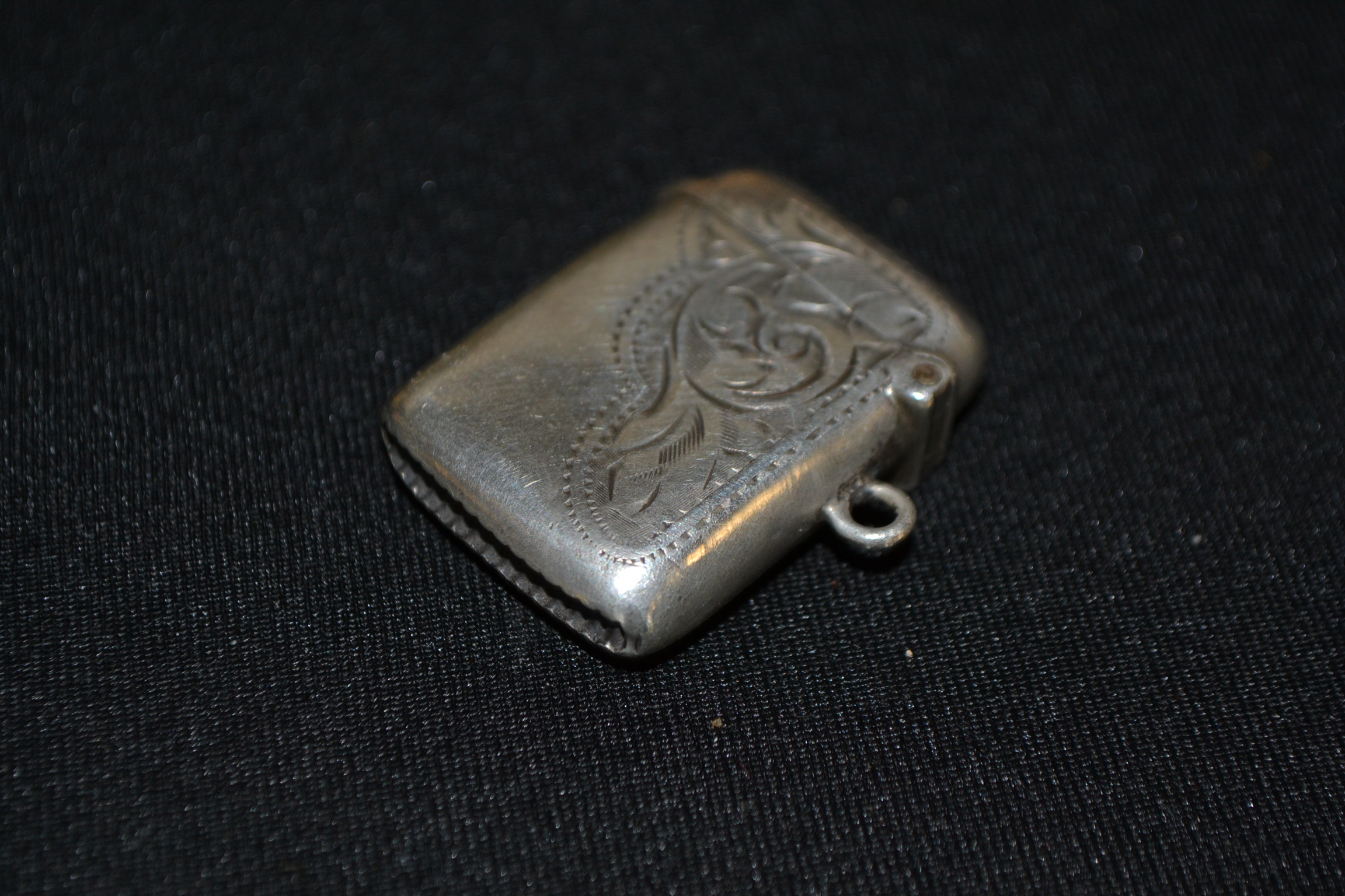 Sterling silver vesta match striker with etched foliates to case. Hallmarked for Birmingham 1906.