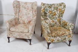 A pair of 20th century wing back armchairs having tapestry covered frames both raised on cabriole