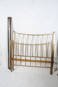 An Edwardian brass double bed complete with original manufacturers label `Tauntons` . The railed