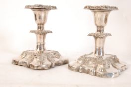 A pair of Mappin and Webb silver plate candle sticks.