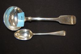 A fiddle pattern hallmarked 89 g ladle with spoon.