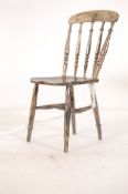 A white silver metal miniature dining chair, tested as silver. Originally made for the vendor by a