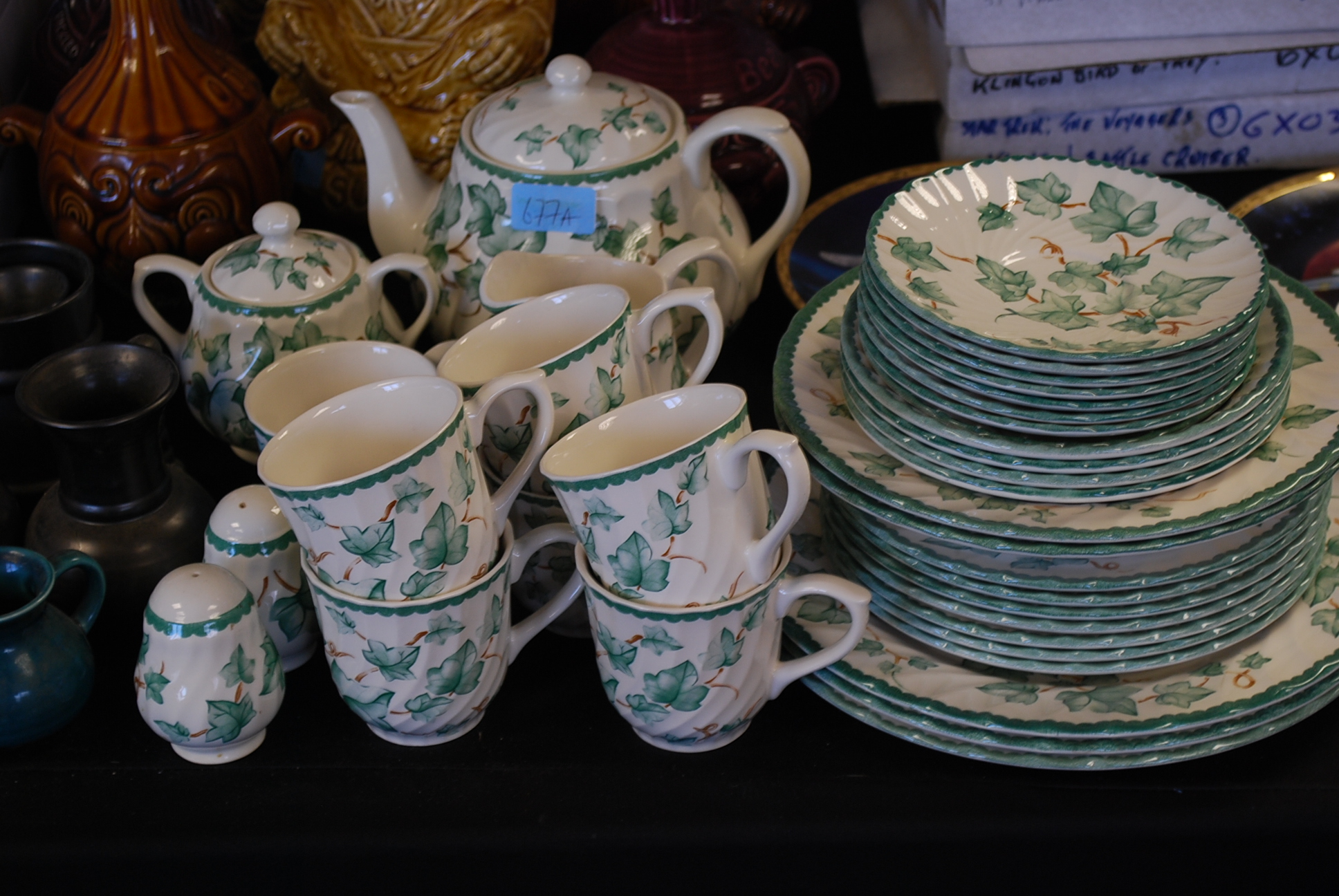 A BHS contemporary dinner / tea servicing comprising cruet set, cups, plates, dinner plates,