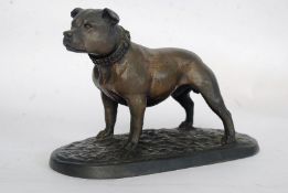 A cast bronzed statue of a bulldog on a plinth base.