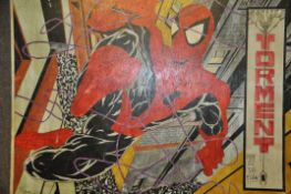 An unusual hand painted Spiderman painting on wooden panel