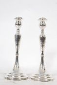 A pair of large white silver metal Georgian style candlesticks, stamped ` 925 ` to base.