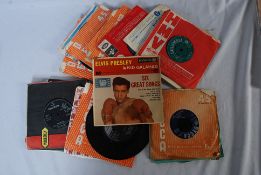 RECORDS: A collection of singles, to include Elvis and others.
