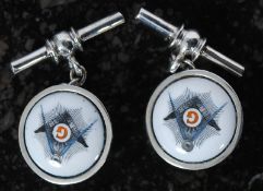 A pair of white metal silver (stamped 925) and enamel set cufflinks, with masonic emblem set