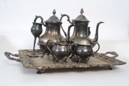 A good vintage silver plate tease comprising teapot, chalice, tray etc.