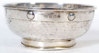 A small hallmarked silver hand beaten ding / bowl with hallmarks to sides.