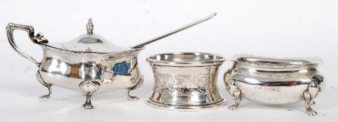 SILVER: Two hallmarked sterling silver mustard pots, one by Edward Sonter 1919, Birmingham, the