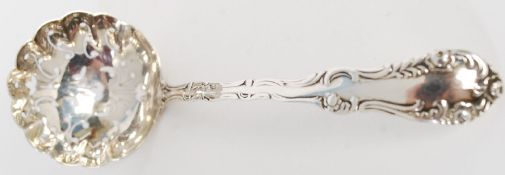 A hallmarked sterling silver Levi & Salaman, Birmingham 1903, silver cating spoon. 21g.