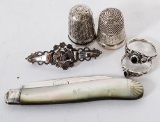 Two hallmarked sterling silver thimbles, one by Charles Horner along with a sterling Love Birds