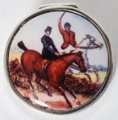 A white silver metal and enamel set pill box depicting horses.